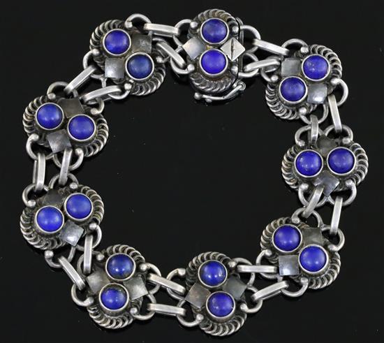 A Danish Georg Jensen sterling silver and lapis lazuli set bracelet, no.8, post 1945 mark, 18cm.